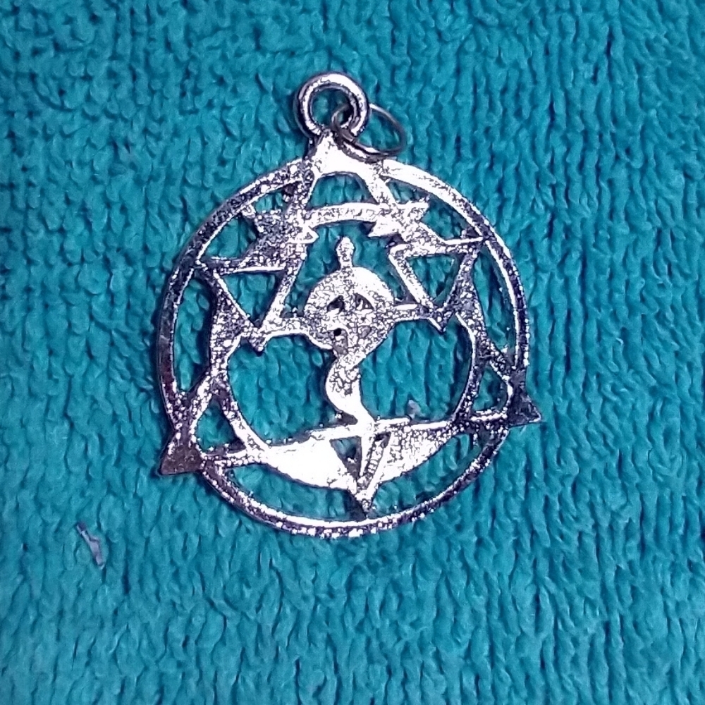 Silver Geometric Pendant no idea what it represents vintage